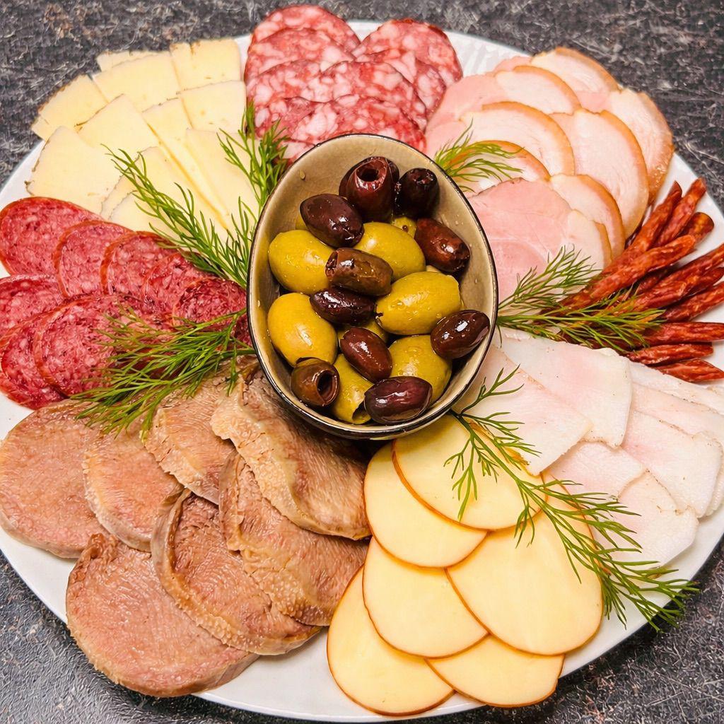 Estonian sausages, pork neck, beef tongue, smoked cheese, pickles, olives